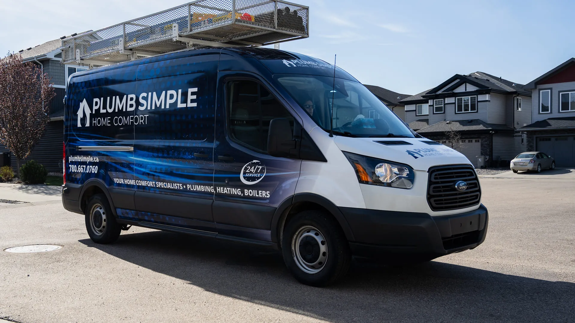 Plumb-Simple-Branded-Service-Van-Parked-On-Residential-Street