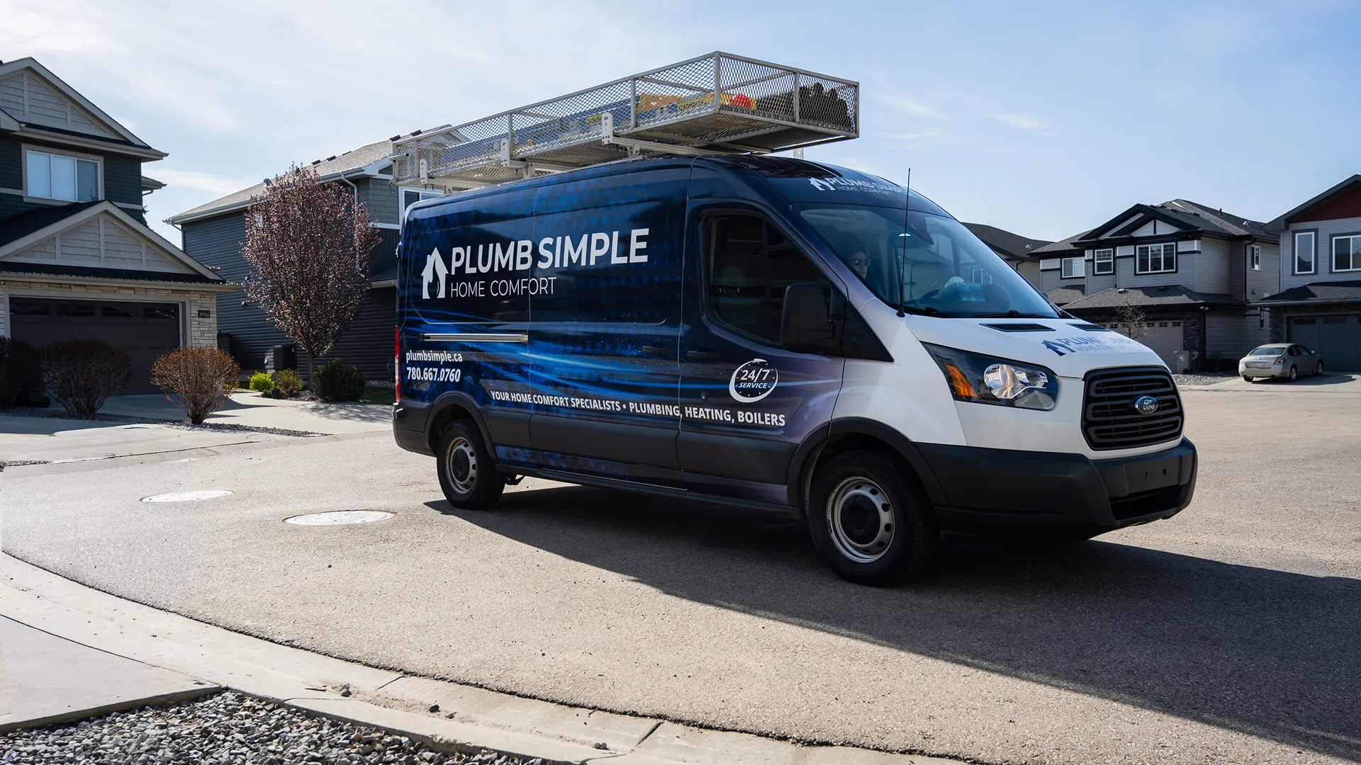 Plumb-Simple-Branded-Service-Van-Parked-On-Residential-Street