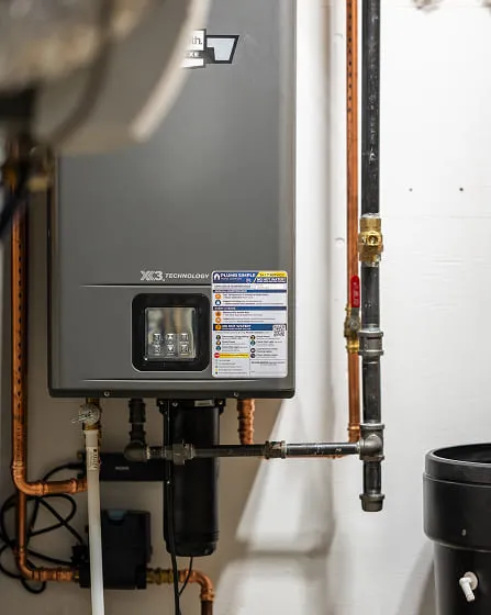 ankless-Water-Heater-With-Plumb-Simple-Maintenance-Sticker
